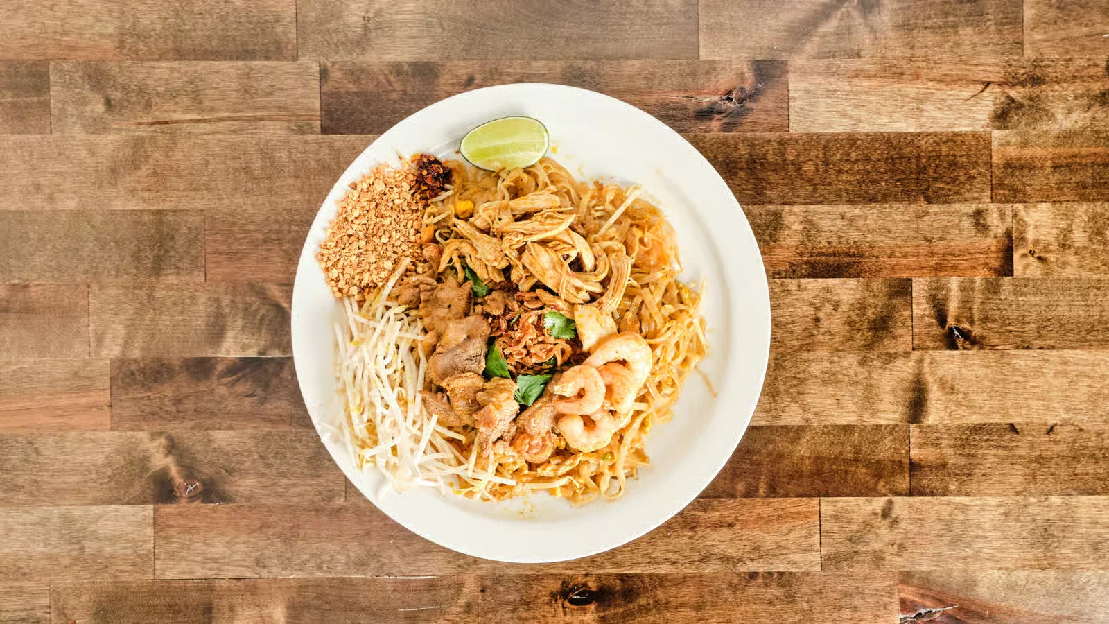 PAD THAI COMBO (PORK,CHICKEN, SHRIMP)
